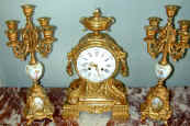 clock_set_dore_bronze_with_garniture_red.jpg (33987 bytes)