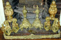 fire_andirons_lion_head_red.jpg (38035 bytes)