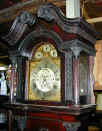 Hall_clock_architectural_hood_detail.jpg (164974 bytes)